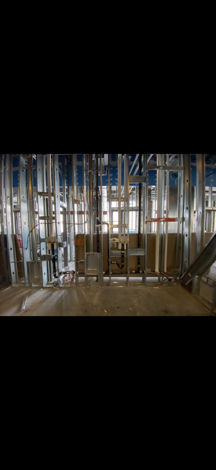Commercial in-wall plumbing rough-in by E&J Plumbing