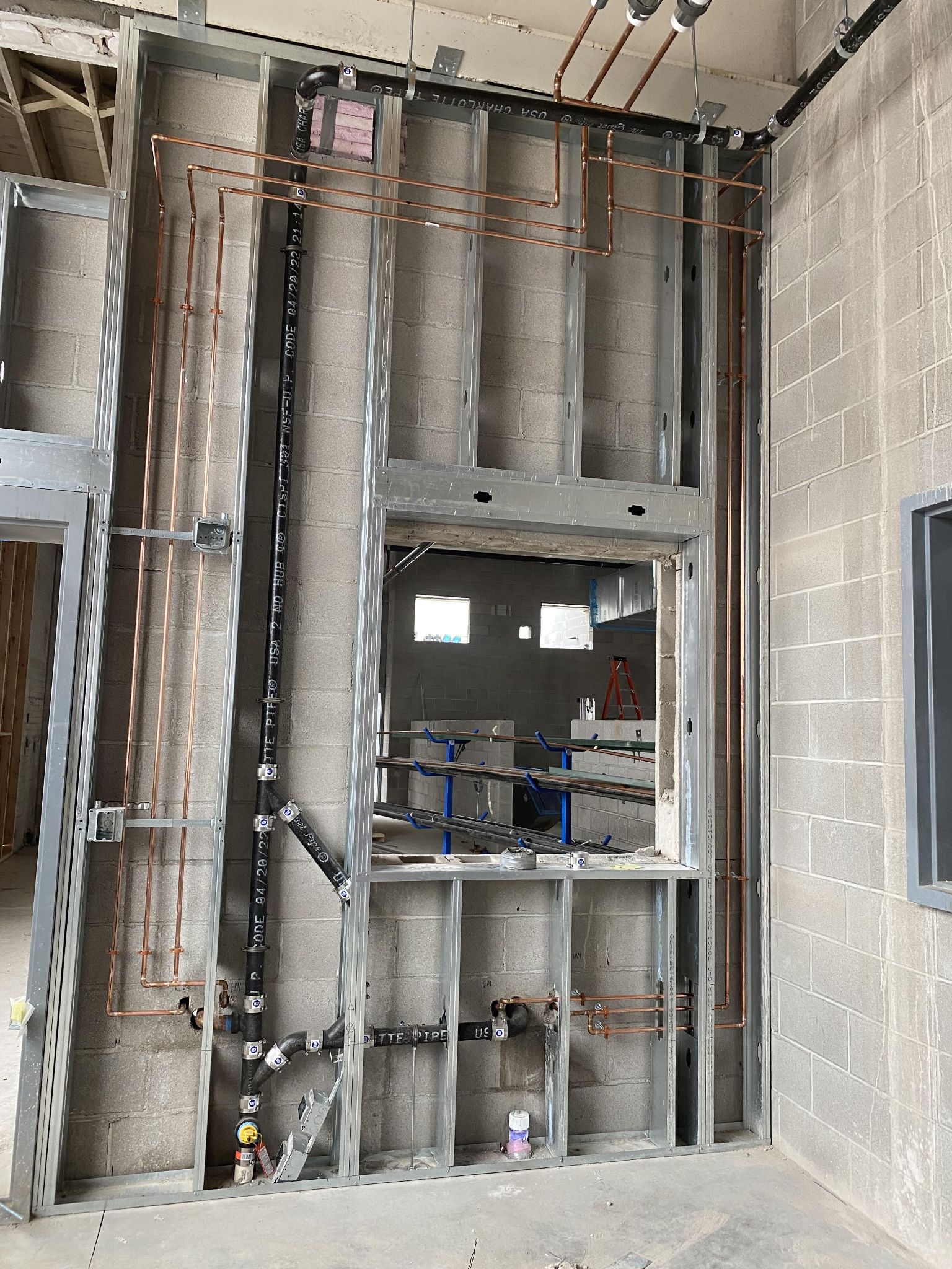Commercial plumbing rough-in by E&J Plumbing